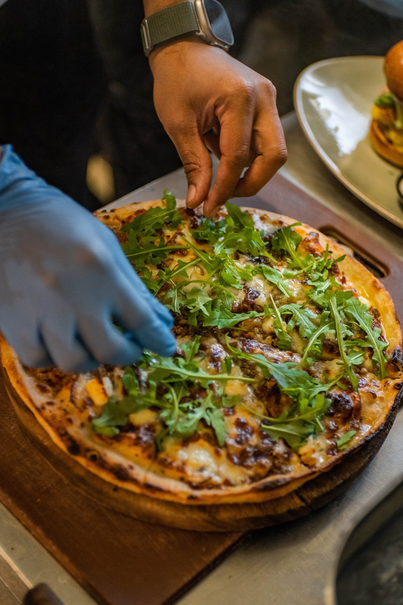Bodega Eatery — pizza finished with rocket